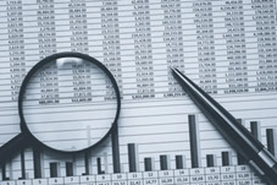 data with graph under a magnifying class