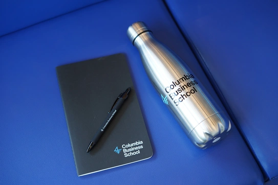 CBS-branded notebook, pen, and (different) water bottle